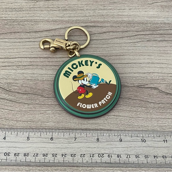 Mickey Mouse x Coach Gardening leather Bag charm - Picture 9 of 9